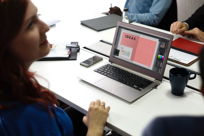 woman sitting in front of a computer.