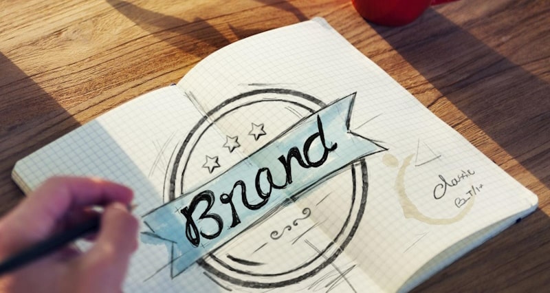 Brand work written in a notebook