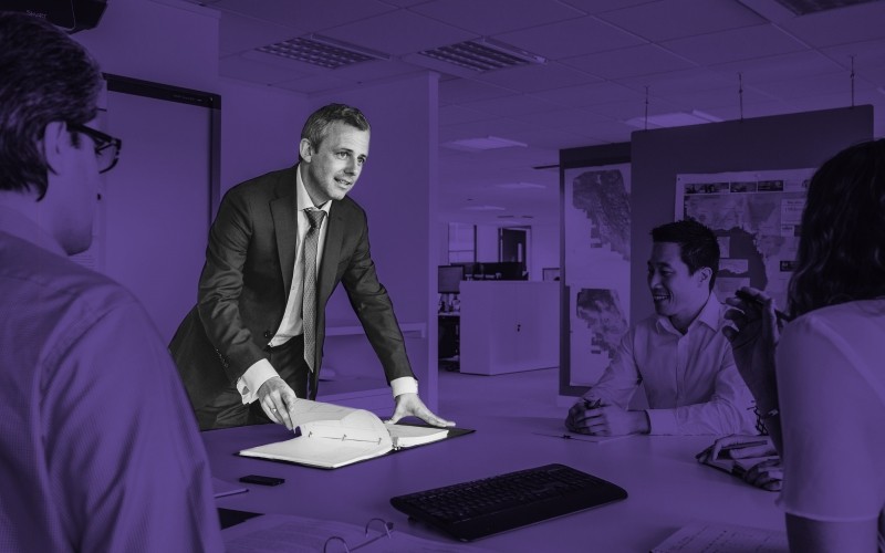 man sitting at a desk.